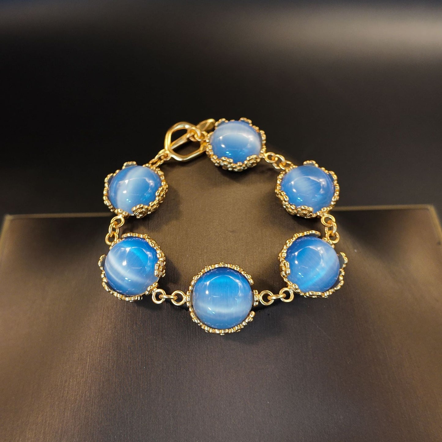 Vintage Blue Cat Eye Stone Flower Embossed Pattern Bracelet and Necklace with Hook Earrings